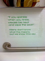 [Sign in Alien Jerky Bathroom]