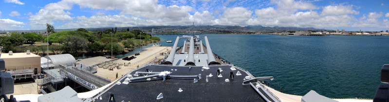 [Bow of the USS Missouri, and the USS Arizona Memorial beyond that]