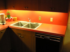 [Kitchen. Notice the 15-degree angle of the countertop.]