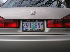 [New plates mounted on my car. Note the inverted UCSD plate frame]