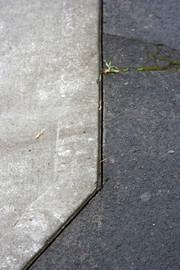 [Gap in Concrete on Driveway]