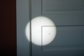 [Venus (small dot) against the sun (big circle)]