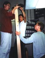[Darrick, Juan and Alex measuring wood]
